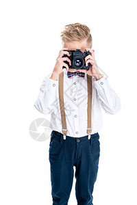 时尚的小摄影师使用白色背景图片