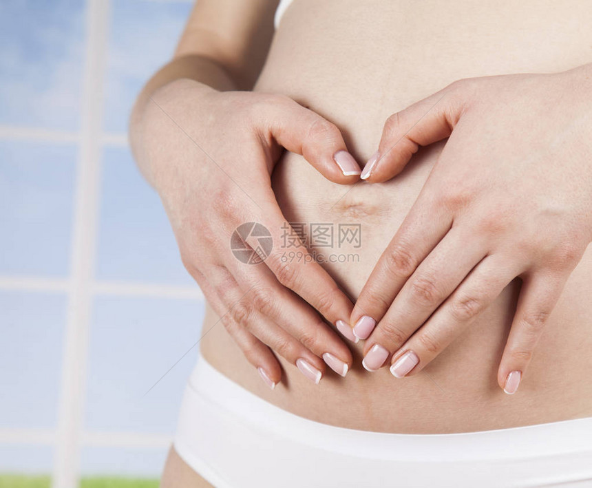美丽的怀孕妇肚子和图片