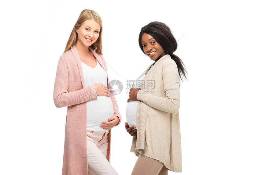 多种族面带微笑的美丽怀孕妇女图片