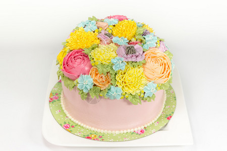 美丽的装饰蛋糕与鲜花图片