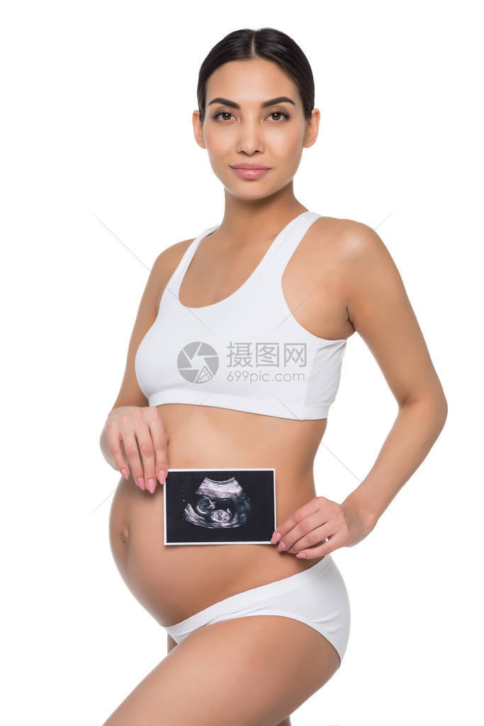 美丽的亚洲孕妇对未出生的婴儿进行超声波扫描图片