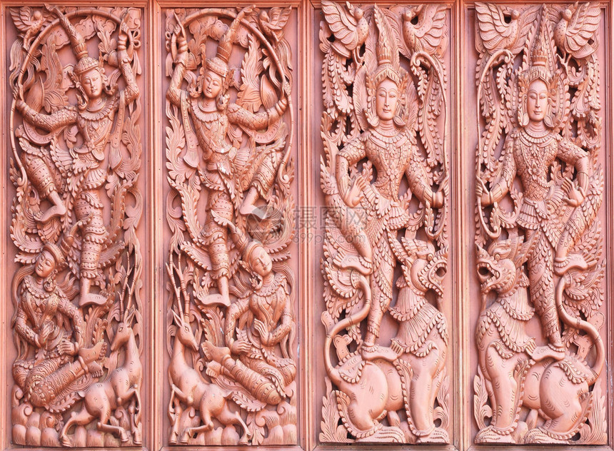 雕刻佛教寺庙墙的木头图片