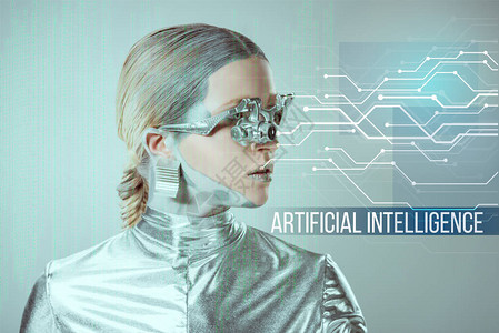 带有假眼的未来派银色机器人用人工智能字样查看灰图片