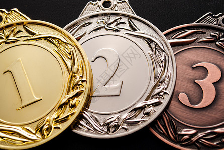 奖品特写的三枚奖牌背景图片