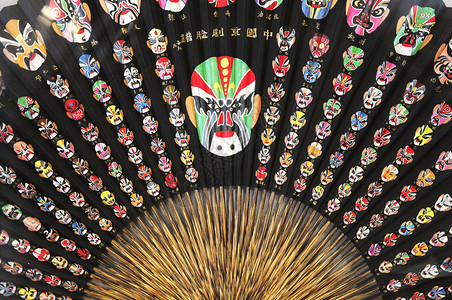 京剧戴面具的扇子图片