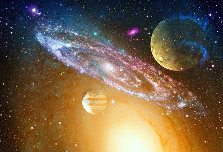 螺旋星系和外层空间中的行星图片
