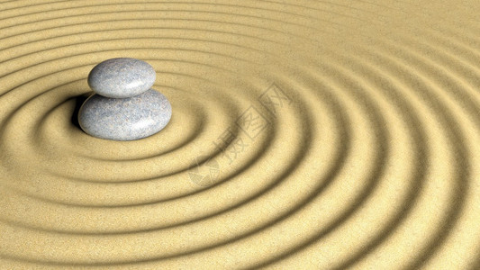 平衡Zen的石头堆积从大到小在沙子图片