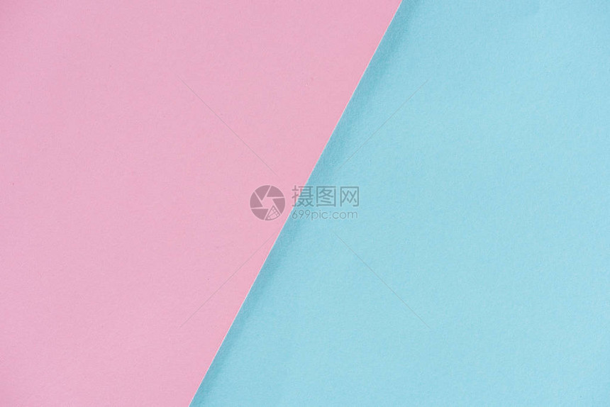 背景粉色和蓝纸层近拍图片