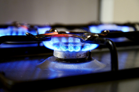 煤气炉的蓝色火焰背景图片