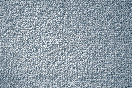 蓝色地毯纹理的特写图片