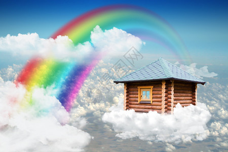 小木屋在彩虹附近的图片