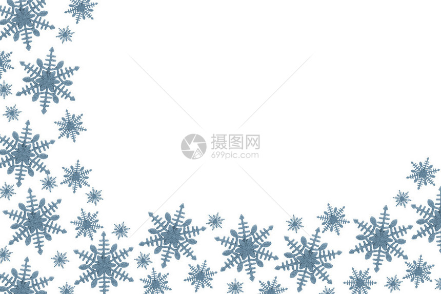 蓝色雪花背景上白色孤立图片