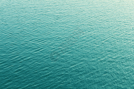 蓝色的水背景与涟漪图片