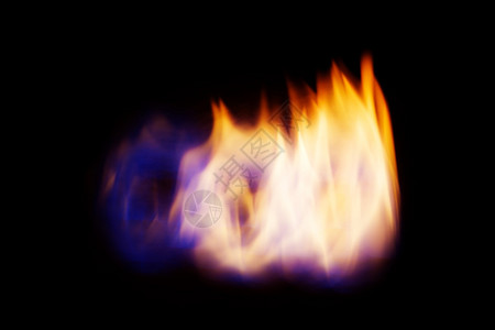 火焰的抽象模糊图像形成天然气壁炉背景图片