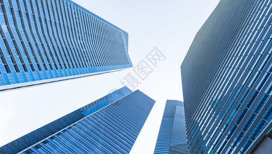 蓝色玻璃墙现代建筑的外观图图片
