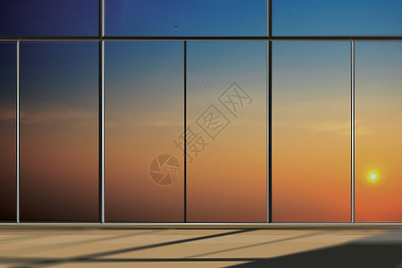 日出时现代办公楼的窗户图片