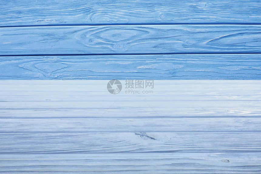 背景为蓝色木板的浅蓝色木地板模图片