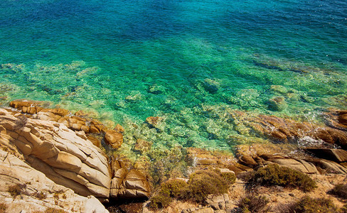 美丽的夏季海景暑假旅行假期希腊的松动海水和岩石海图片