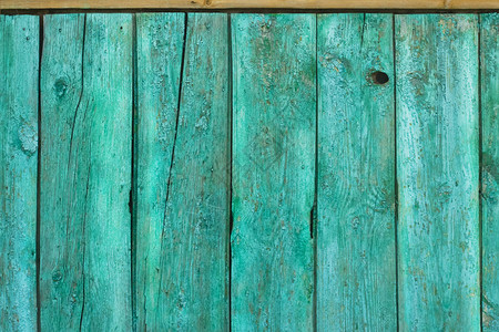 古老的式木质纹理漆成绿色蓝色的墙壁开裂的油漆用于设计的垃圾彩图片