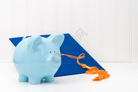蓝猪银行和毕业上限传播高等教育成本的概念教育图片