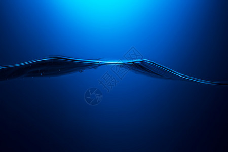 蓝色背景的水曲线波在演播室拍摄图片