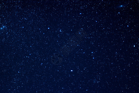 深蓝夜空星光暗蓝色天背景图片