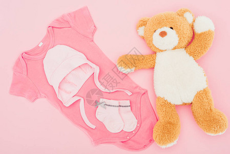 泰迪熊的顶部外观婴儿衣服背景图片