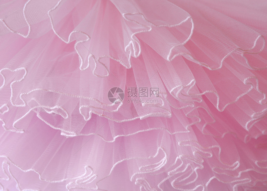 美丽的精致粉红色织物背景层图片