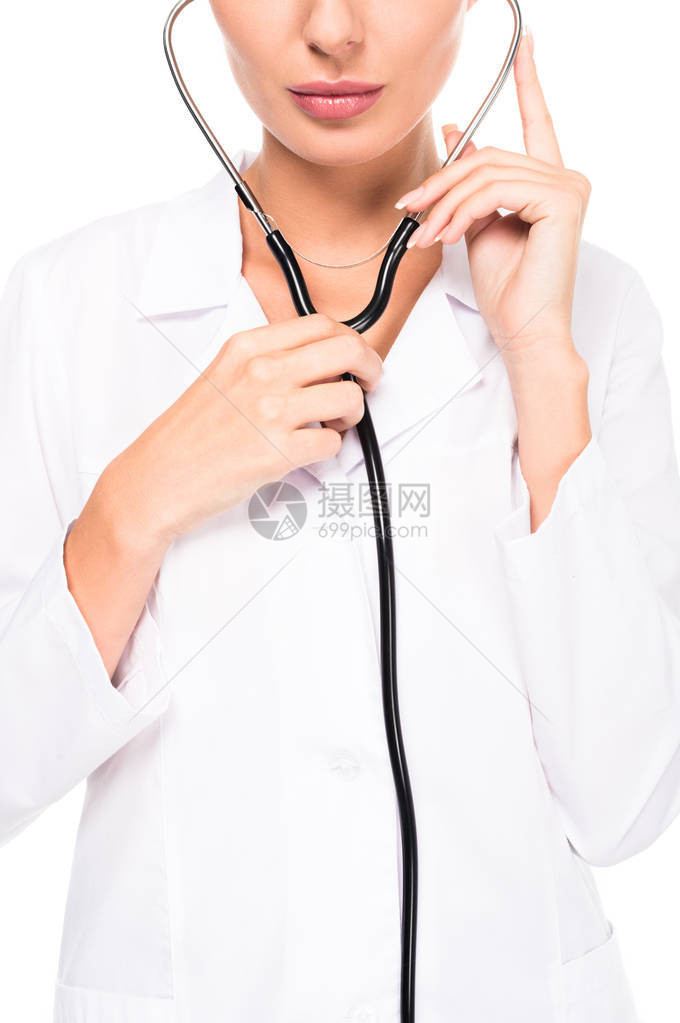 白大衣医生用在白色上隔离的医学听诊图片