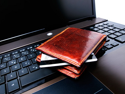 网上购物的概念观用信卡wallet和笔记图片