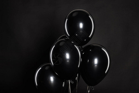 黑色周五概念的黑气球背景图片