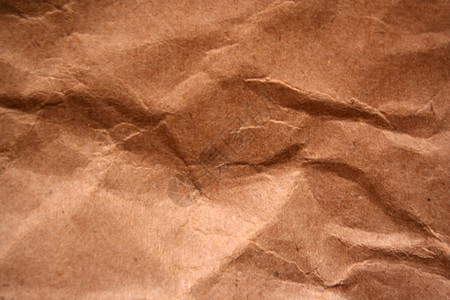 起皱的棕色纸袋背景纹理图片