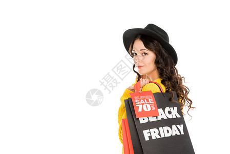 黑色星期五销售时持有购物袋的有吸引力的时装髦商店客图片