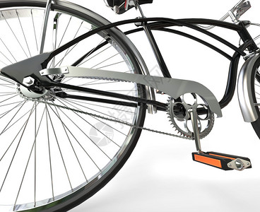 自行车链条踏板和后轮的特写图片