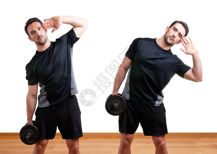 在健身房训练腹部做哑铃侧弯图片