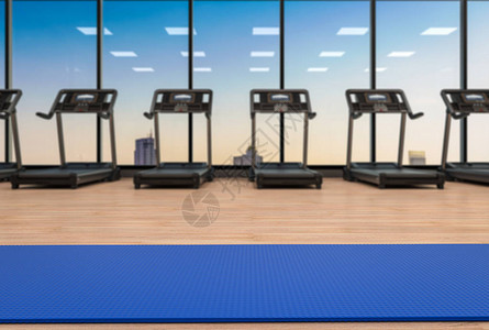 3d在健身房渲染蓝色瑜伽垫图片
