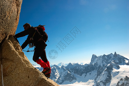 男登山者摇滚攀岩运动横向定白天光背景图片