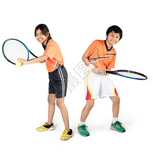 年幼的亚洲儿童打网球图片