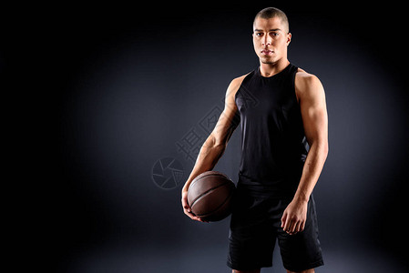 年轻的非洲裔美国篮球运动员黑色球图片