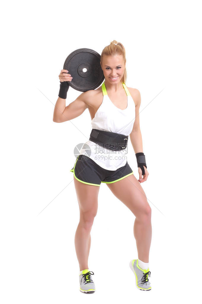 运动的年轻女子做举重锻炼图片