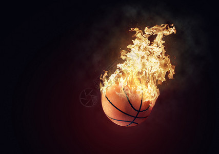 概念燃烧篮球飞行在图片