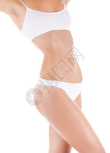 妇女腰部的美容肚子腿穿内裤感身材的女孩与白色背景隔绝的SPA纤图片
