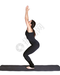 长的美女肖像在健身席上练瑜伽图片