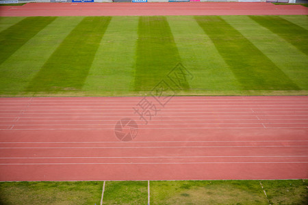 体育场内的跑道背景图片