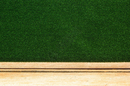 绿草墙纹理背景有空间的人造草墙背图片