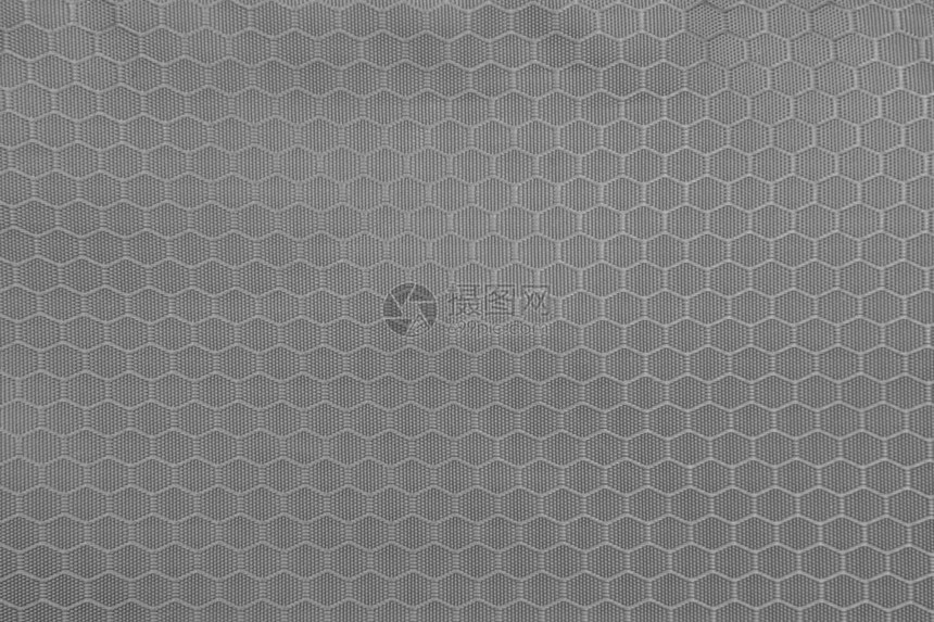 灰色蜂窝背景纹理聚酯织物的纹理背景图片