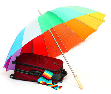 旅行袋和伞是节日快乐的必要文章图片