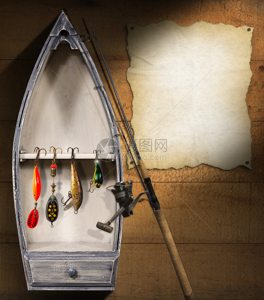 棕色木墙有小船渔具和空的羊皮纸图片