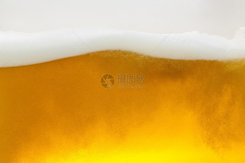 啤酒泡沫波金色啤酒杯玻璃泡沫王冠喷洒酒精蘑菇图片