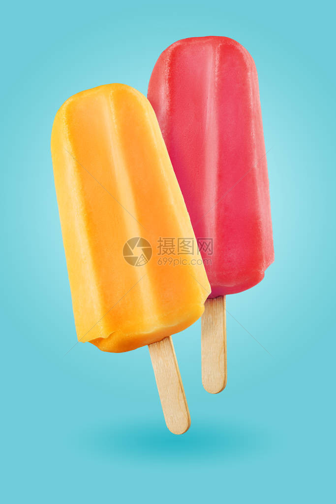 蓝色背景上的黄色和紫色冰棒淇淋棒图片